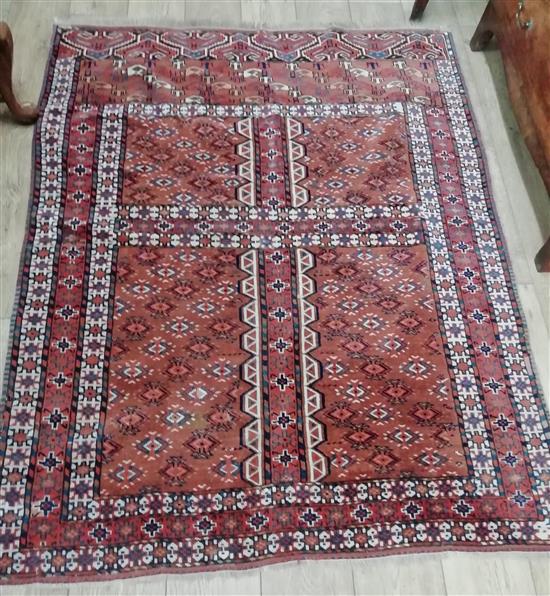 A Tekke style red ground rug 164 x 130cm